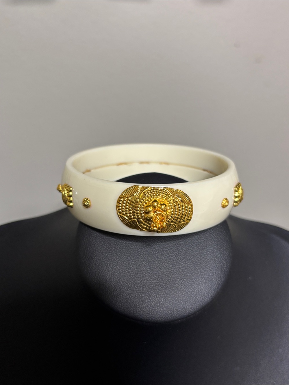 Ivory Vintage Cache Plastic Bangle with Gold Medallion Accent